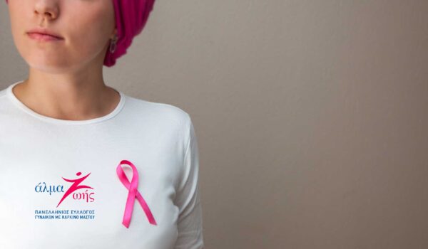 girl-white-t-shirt-with-pink-ribbon-her-breast-defeating-cancer [Recovered]-01